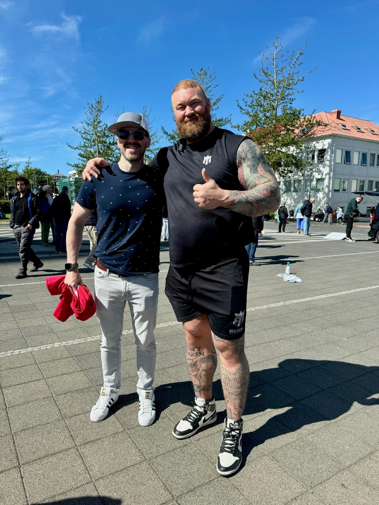 Julian Murphy posing with Hafþór Júlíus Björnsson (who played the mountain on Game of Thrones) on a street in Reykjavík, Iceland